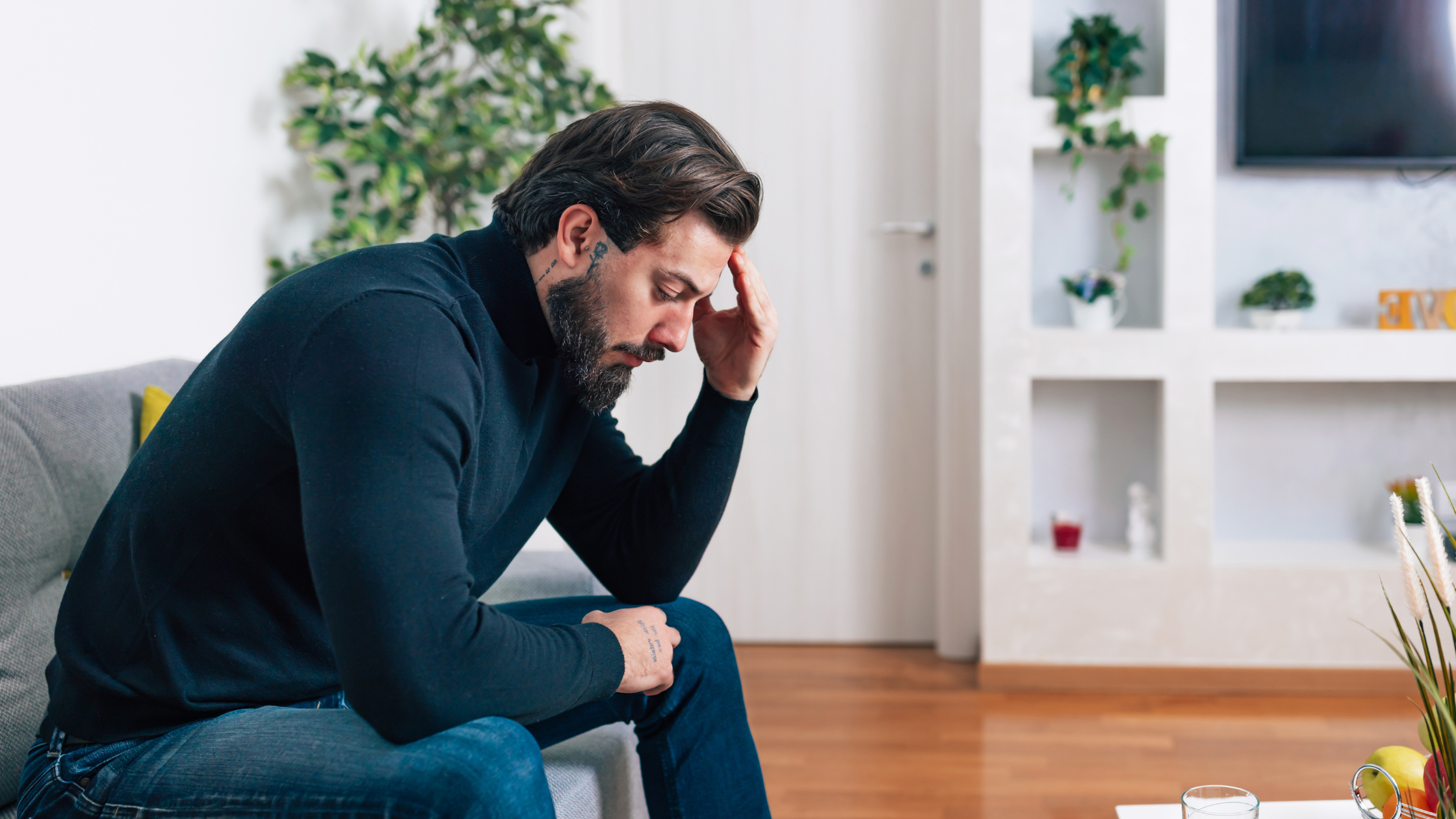 Depressed man in counseling focusing on mental health Services